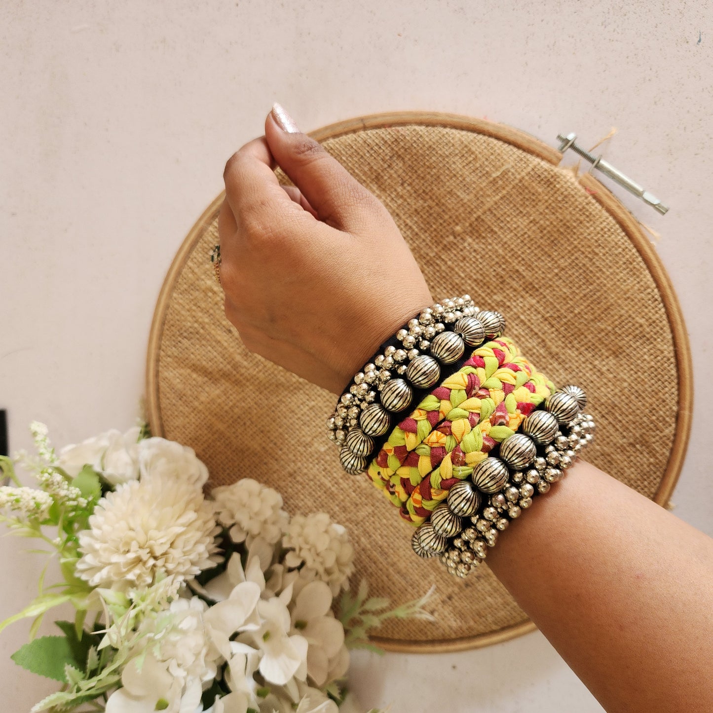 Adjustable Handmade Yellow & Red Braided Handcuff with Silver Bead Work