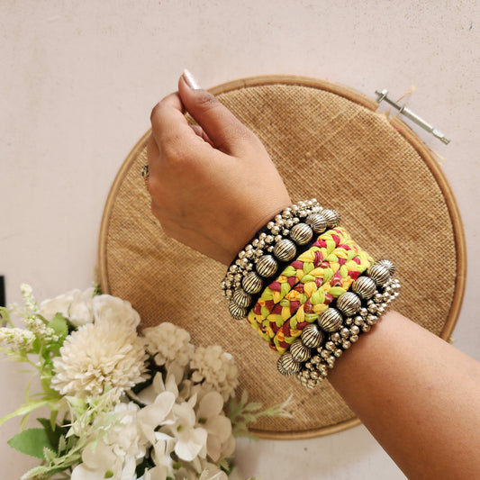 Adjustable Handmade Yellow & Red Braided Handcuff with Silver Bead Work